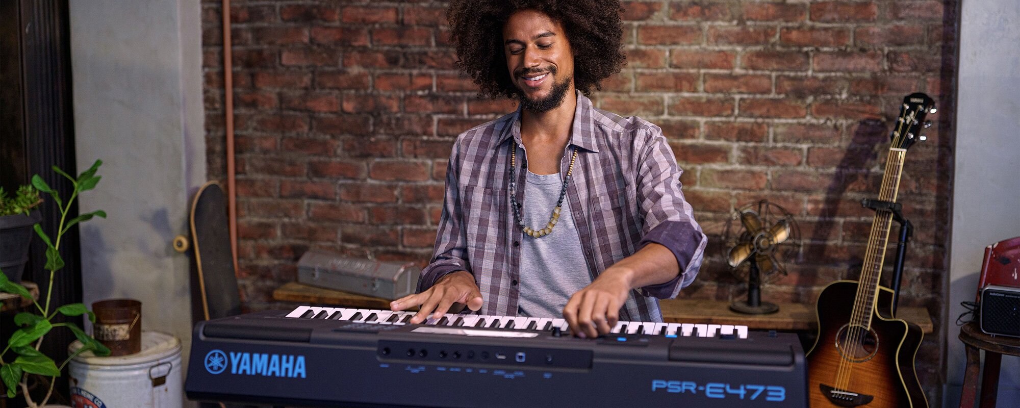 Man playing PSR-E473 Keyboard 2