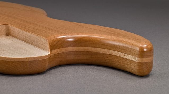 image of guitar body with alder/maple/alder lamination  