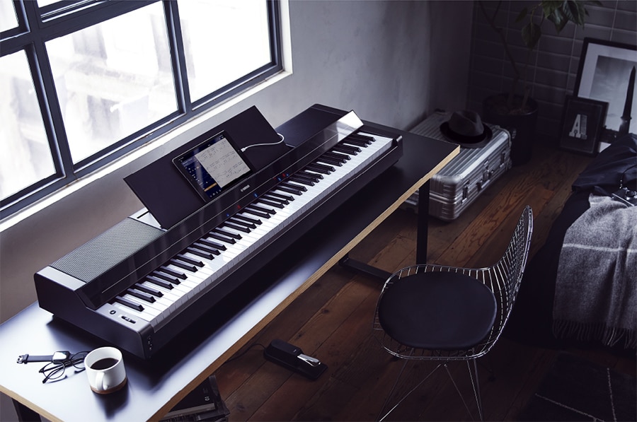 A Yamaha P-S500 Portable Digital Smart Piano on a desk