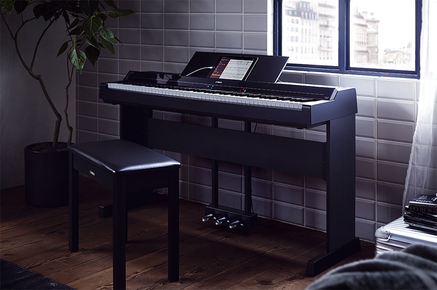 A Yamaha P-S500 Portable Digital Smart Piano in a room