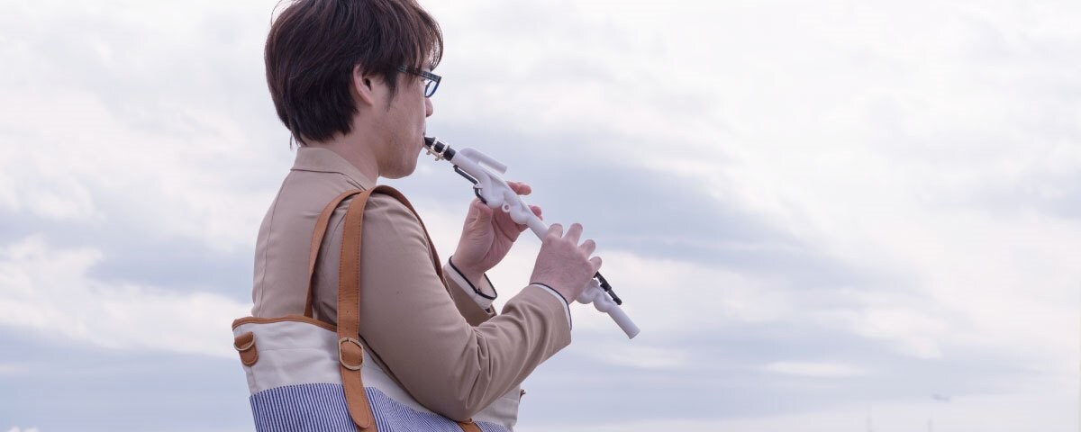 man playing Venova Casual Wind Instrument